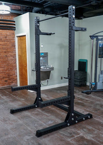 fitness store black squat rack with bar on the top