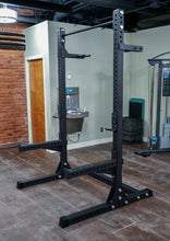 Load image into Gallery viewer, fitness store black squat rack with bar on the top

